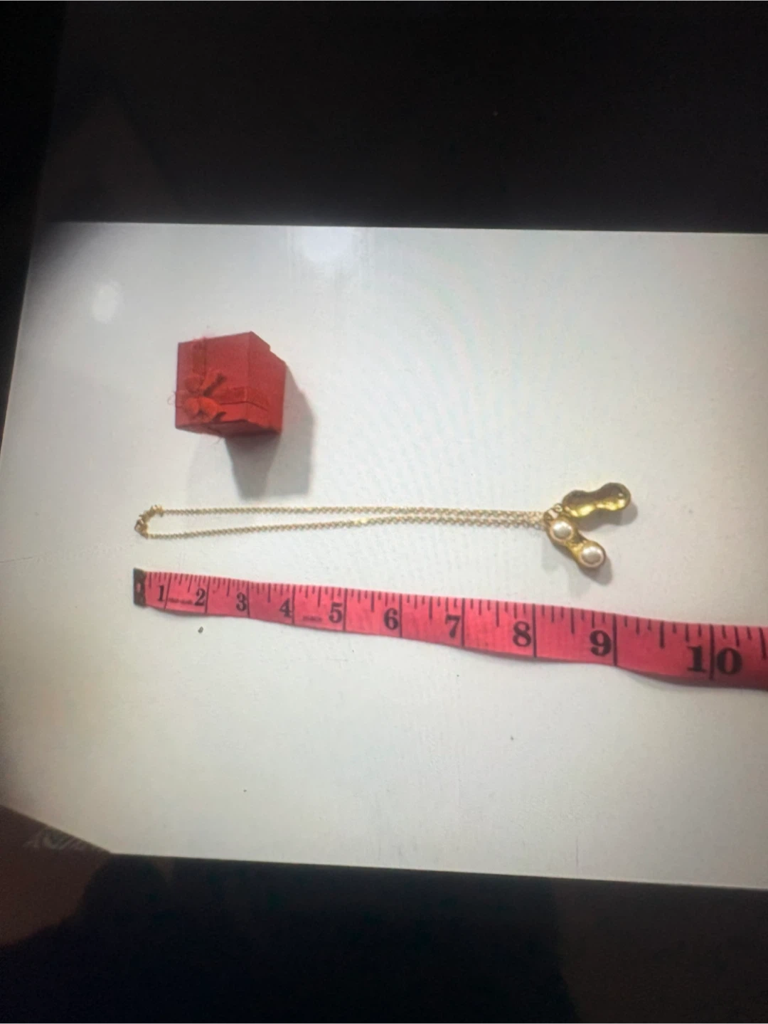 Collier plaqué or avec pendentif cacahuète et perles - photo 3