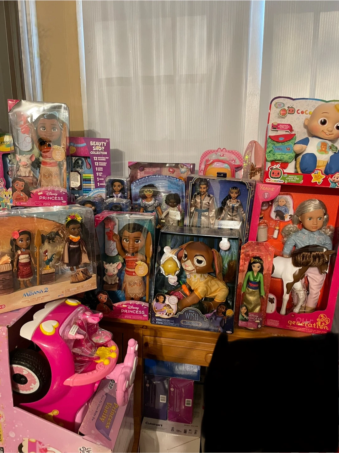 Assorted Disney Princess, Moana, and CoComelon Toys
