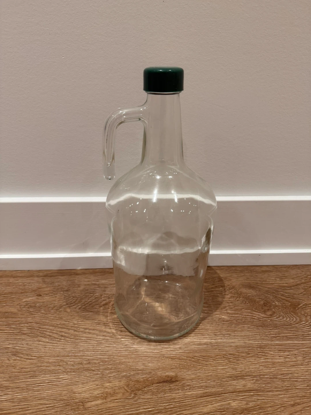 Glass Growler Bottle with Green Cap