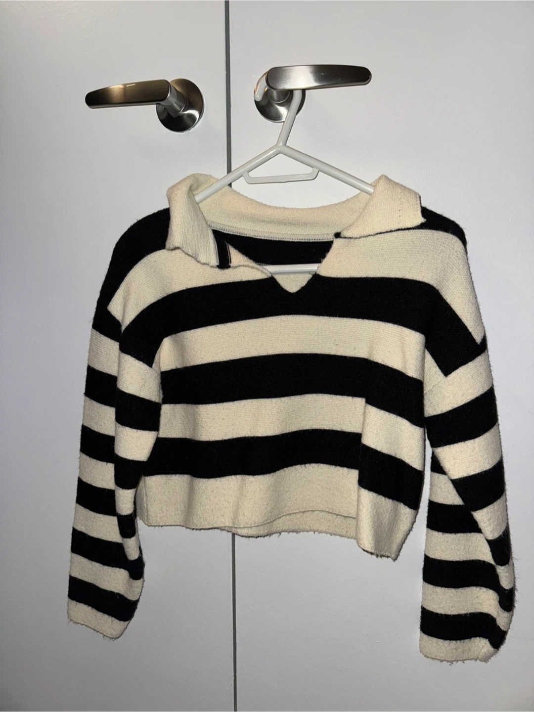 Mixed sweaters size small