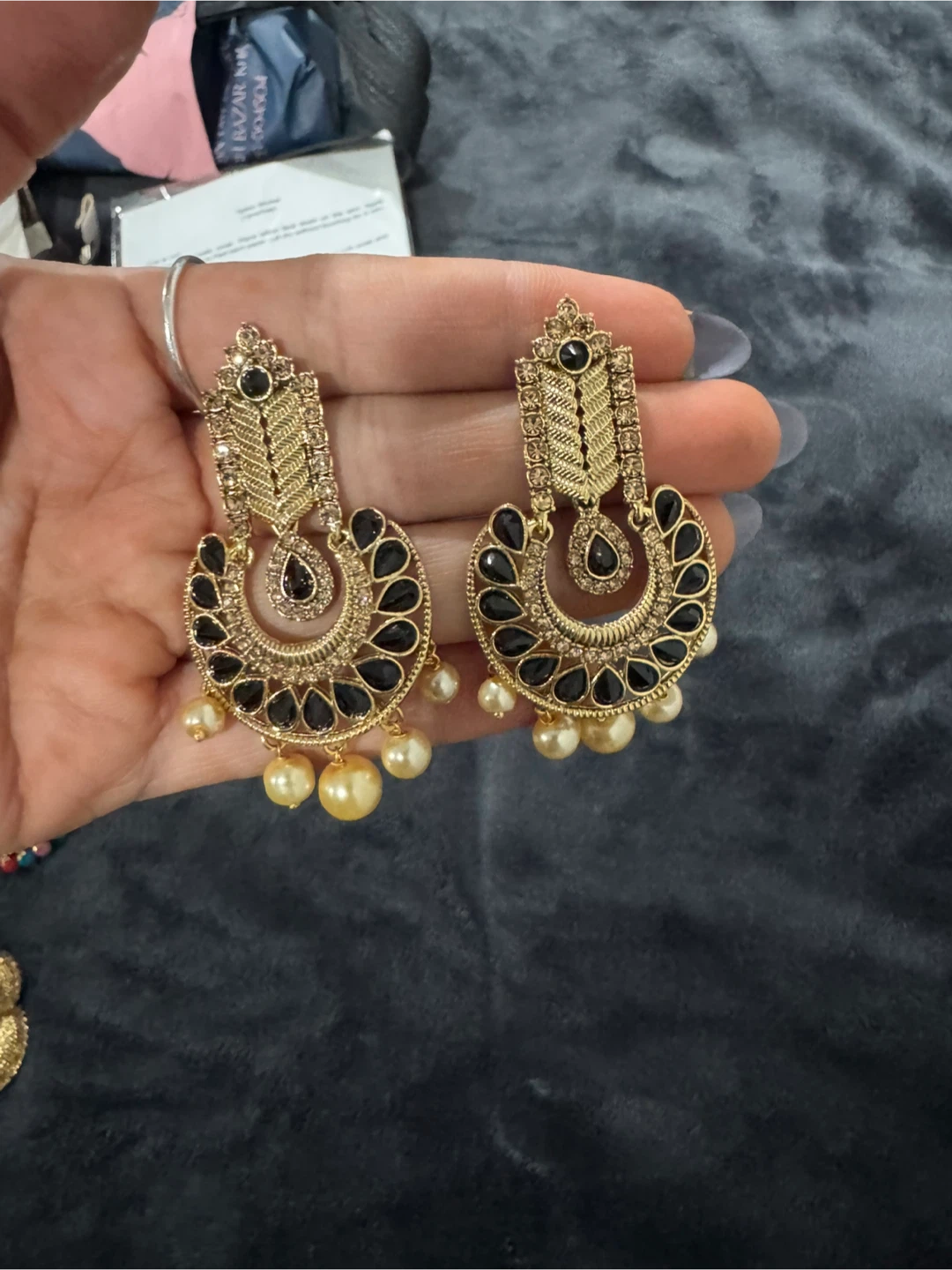 Gold tone statement earrings with black stones and pearls
