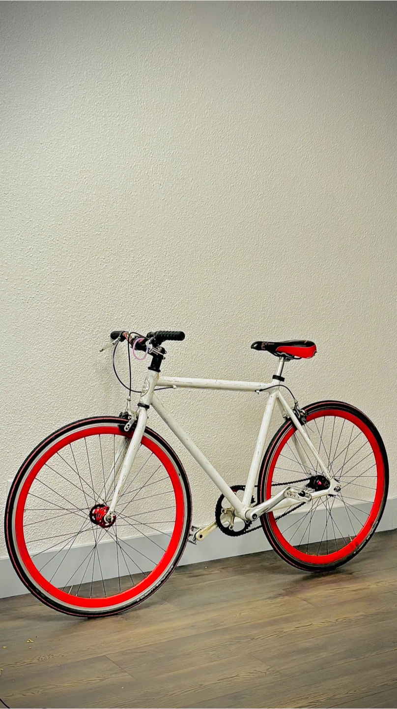 White Fixie Bike with Red Rims