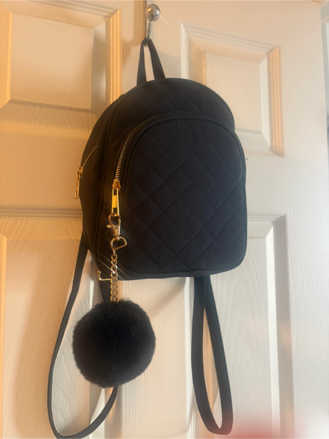 Black Quilted Mini Backpack with Pom Pom Charm