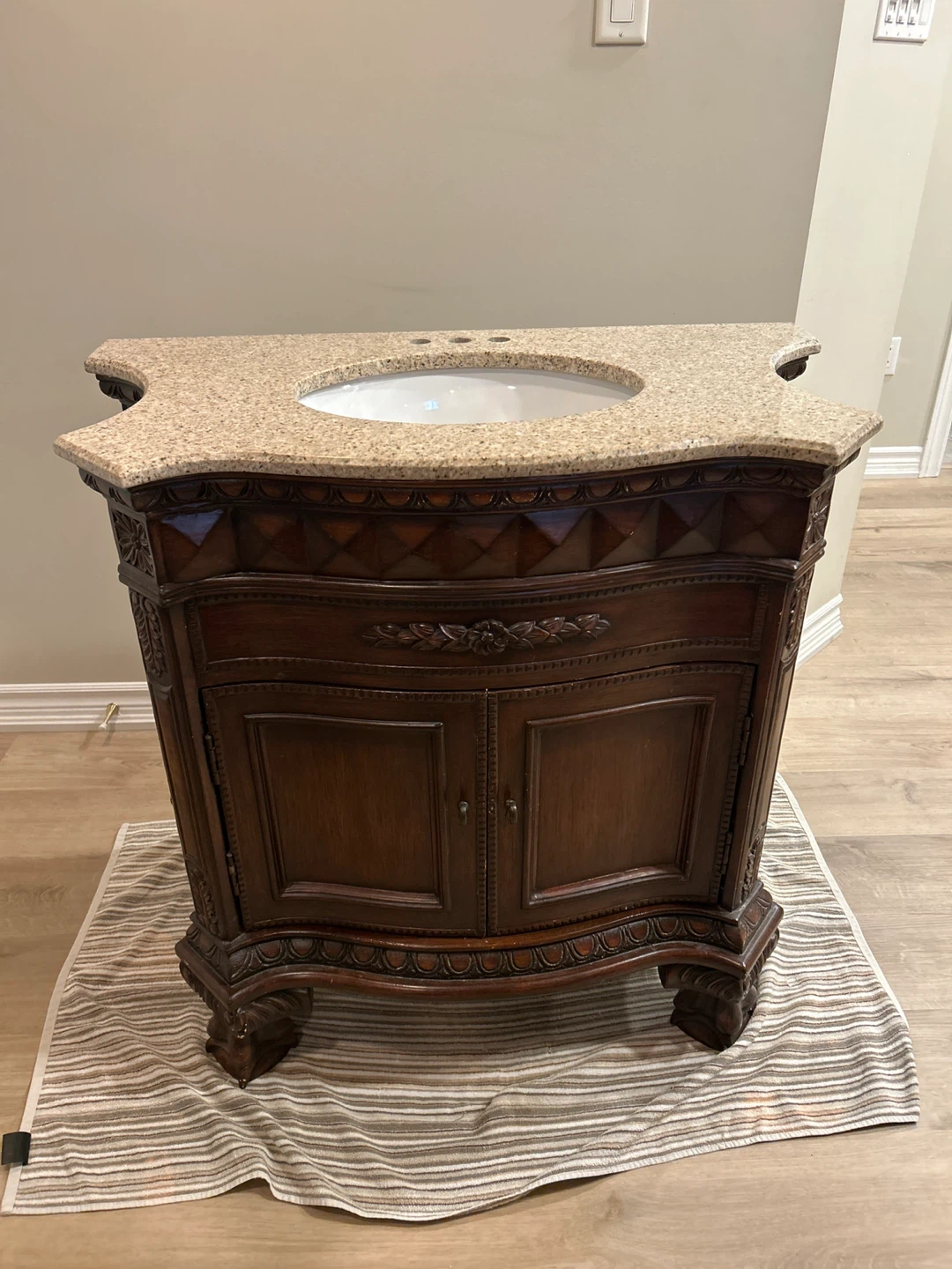 Dark Wood Vanity with Granite Top