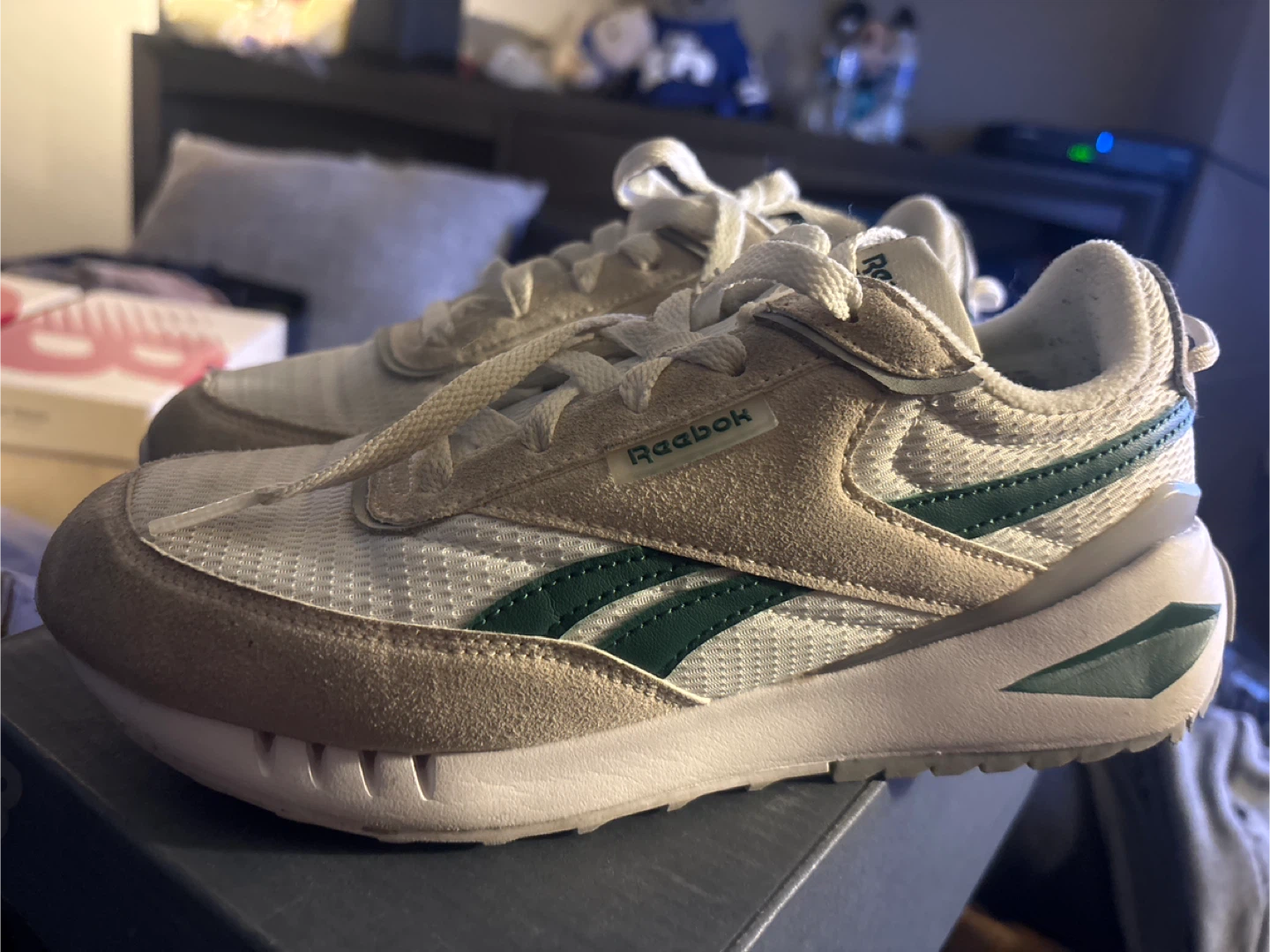 Green and white Reebok Sneakers