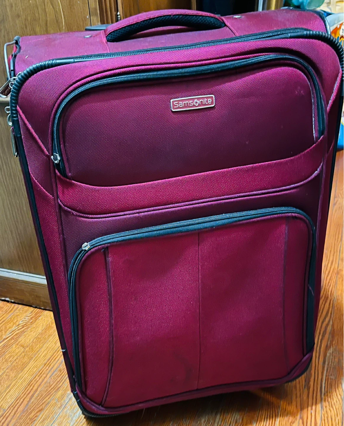 Samsonite Burgundy Rolling checked Luggage
