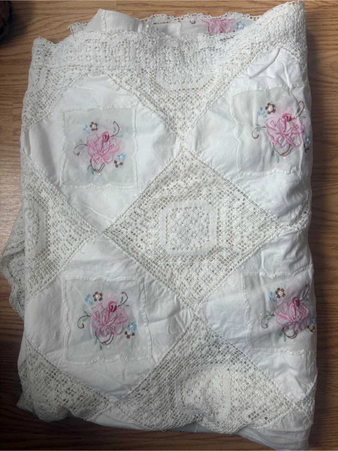 White Quilt with Pink Floral Embroidery and Lace Trim