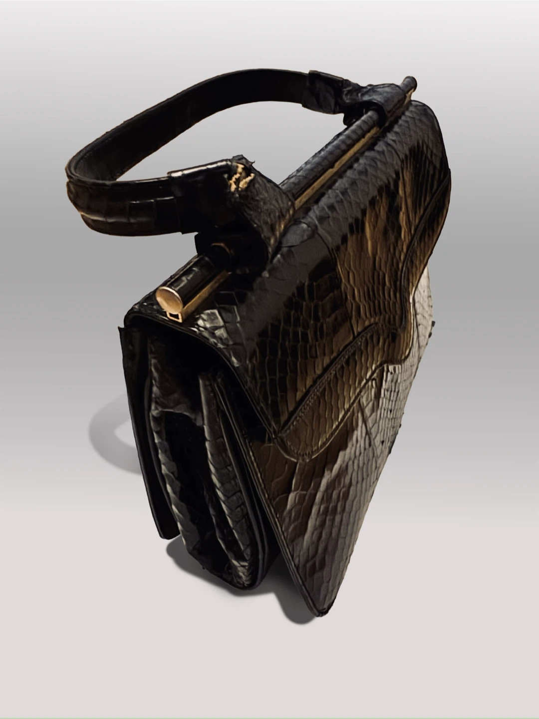 Black snakeskin handbag