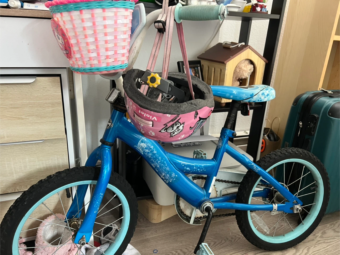 Blue Kids Bike with Pink Basket and Helmet