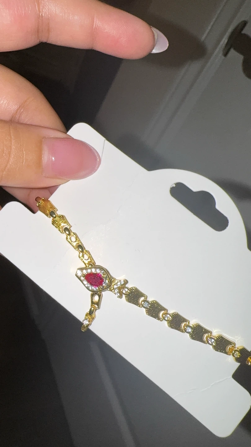 Gold-tone Bracelet with Red Stone and Crystals
