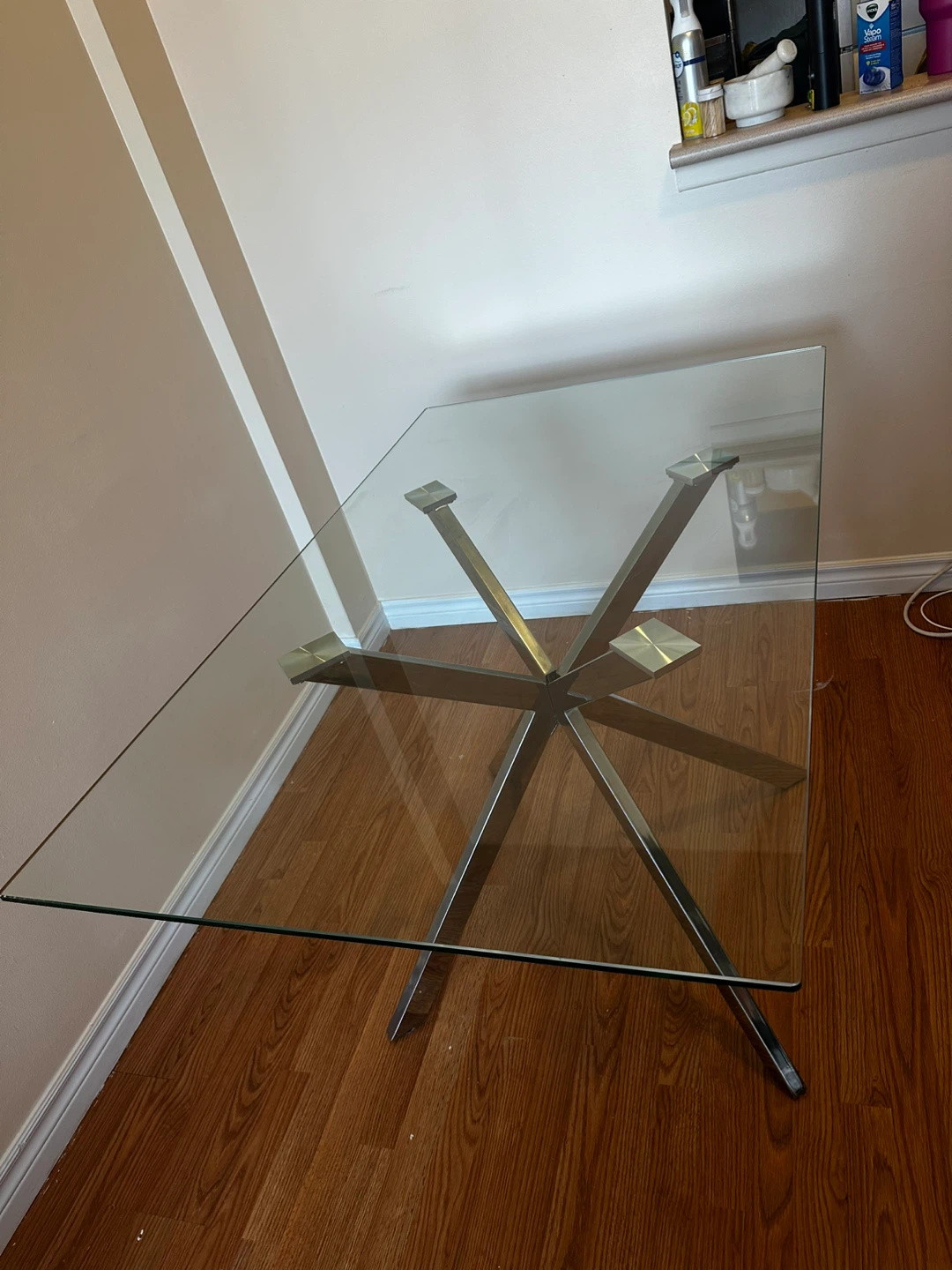 Glass top dining table with metal base - photo 2