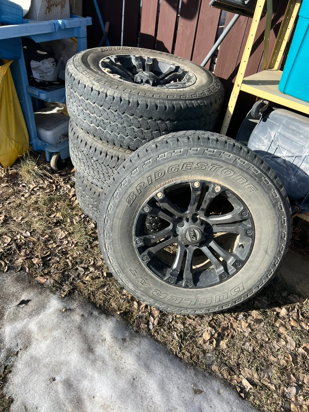 4 Bridgestone Dueler A/T Tires on Black Rims