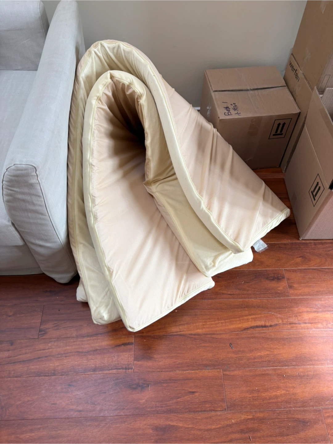 Queen size. Cream coloured foam mattress topper