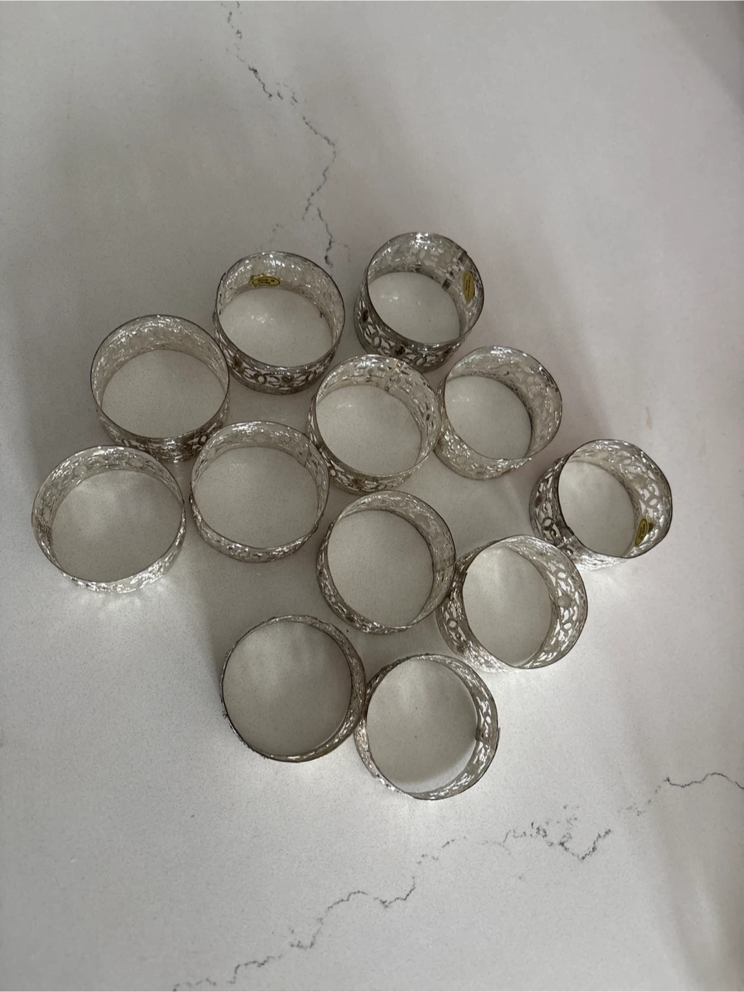 Set of 12 Silver Tone Napkin Rings