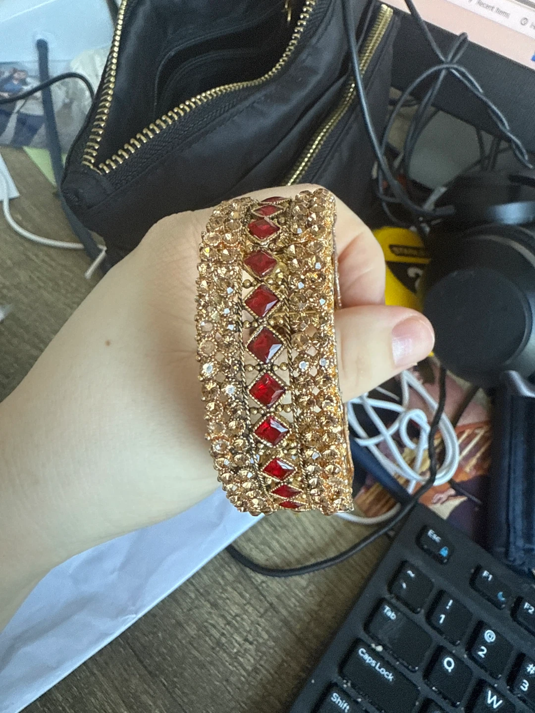 Gold Tone Bangle with Red and Clear Stones