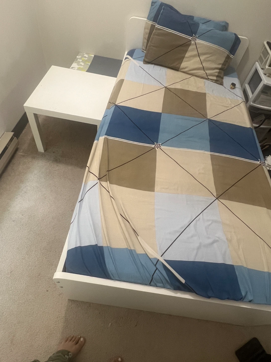 White Twin Bed Frame with Duvet and Pillows