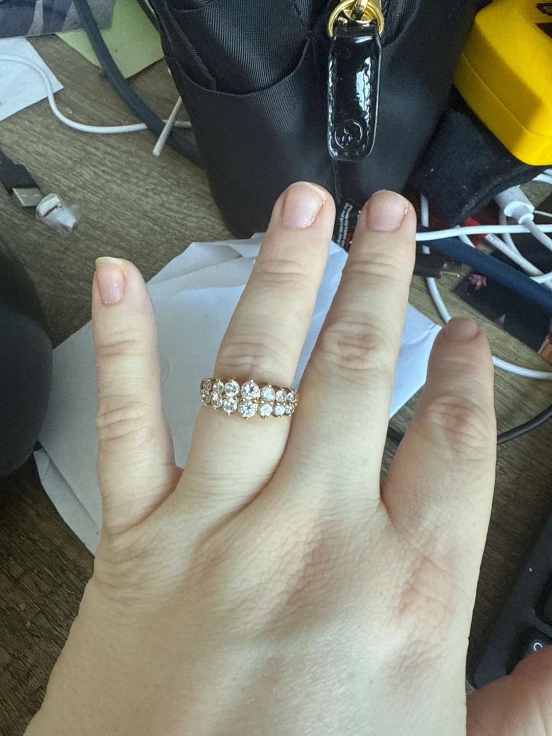 Gold-tone ring with clear stones