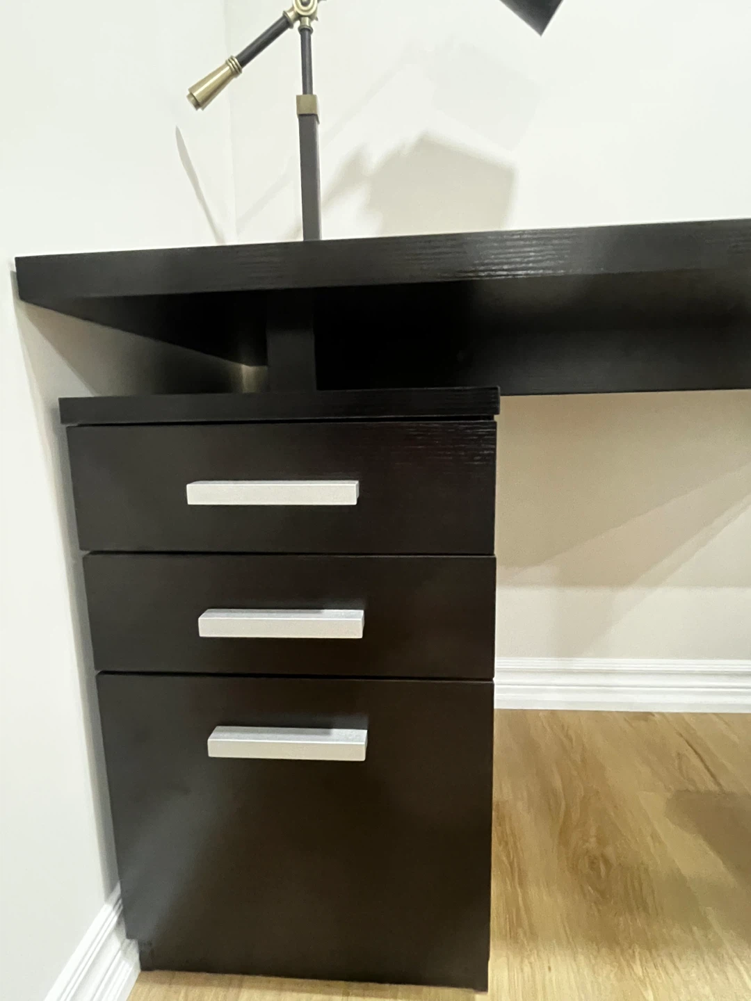 Black desk with three drawers