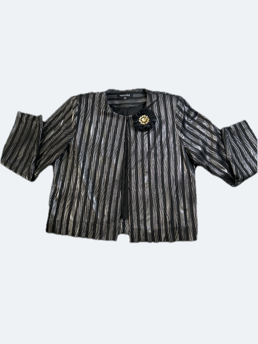 Kathy Cole  black and silver jacket