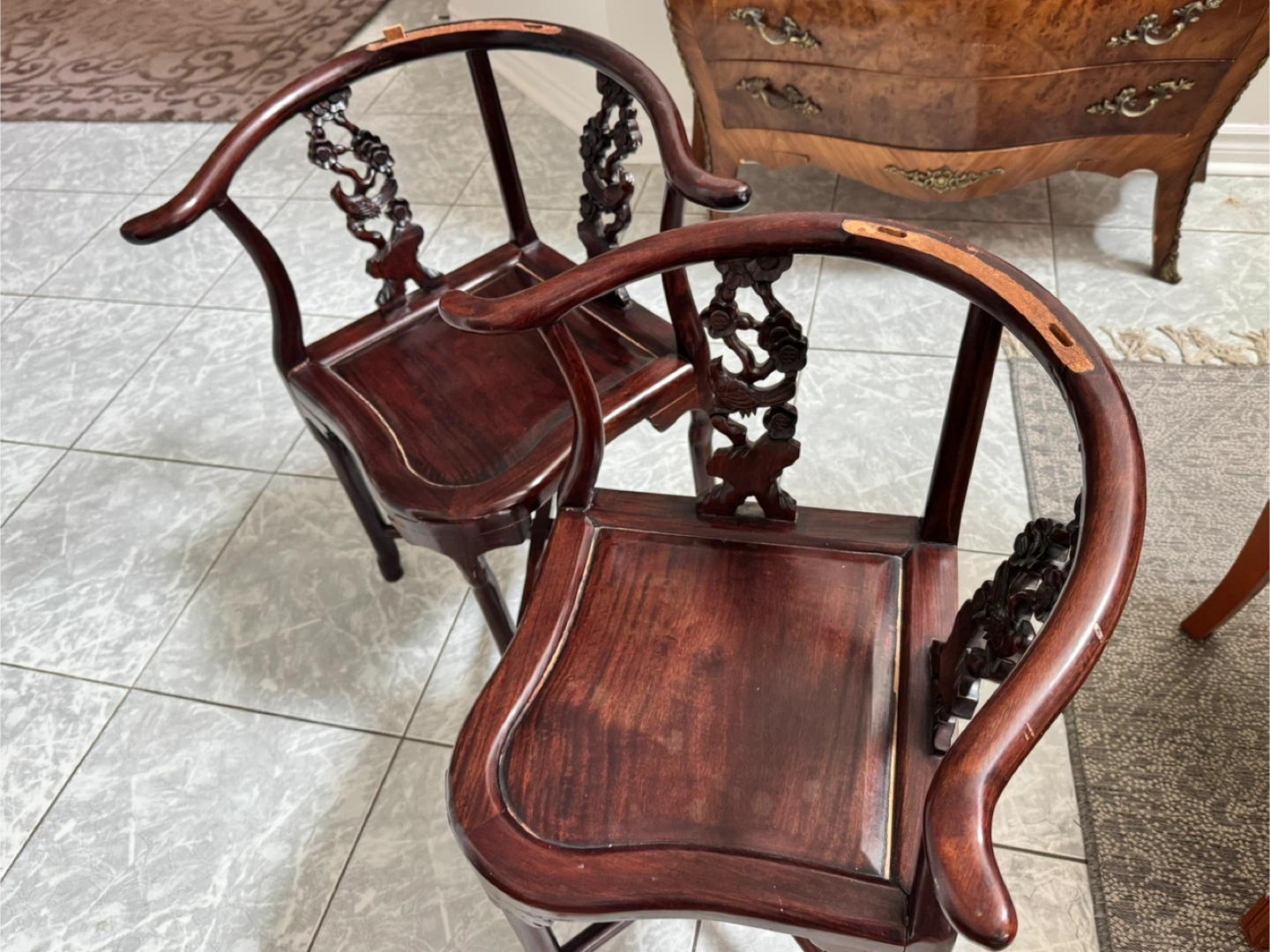 Pair of Dark Wood Corner Chairs with Carvings