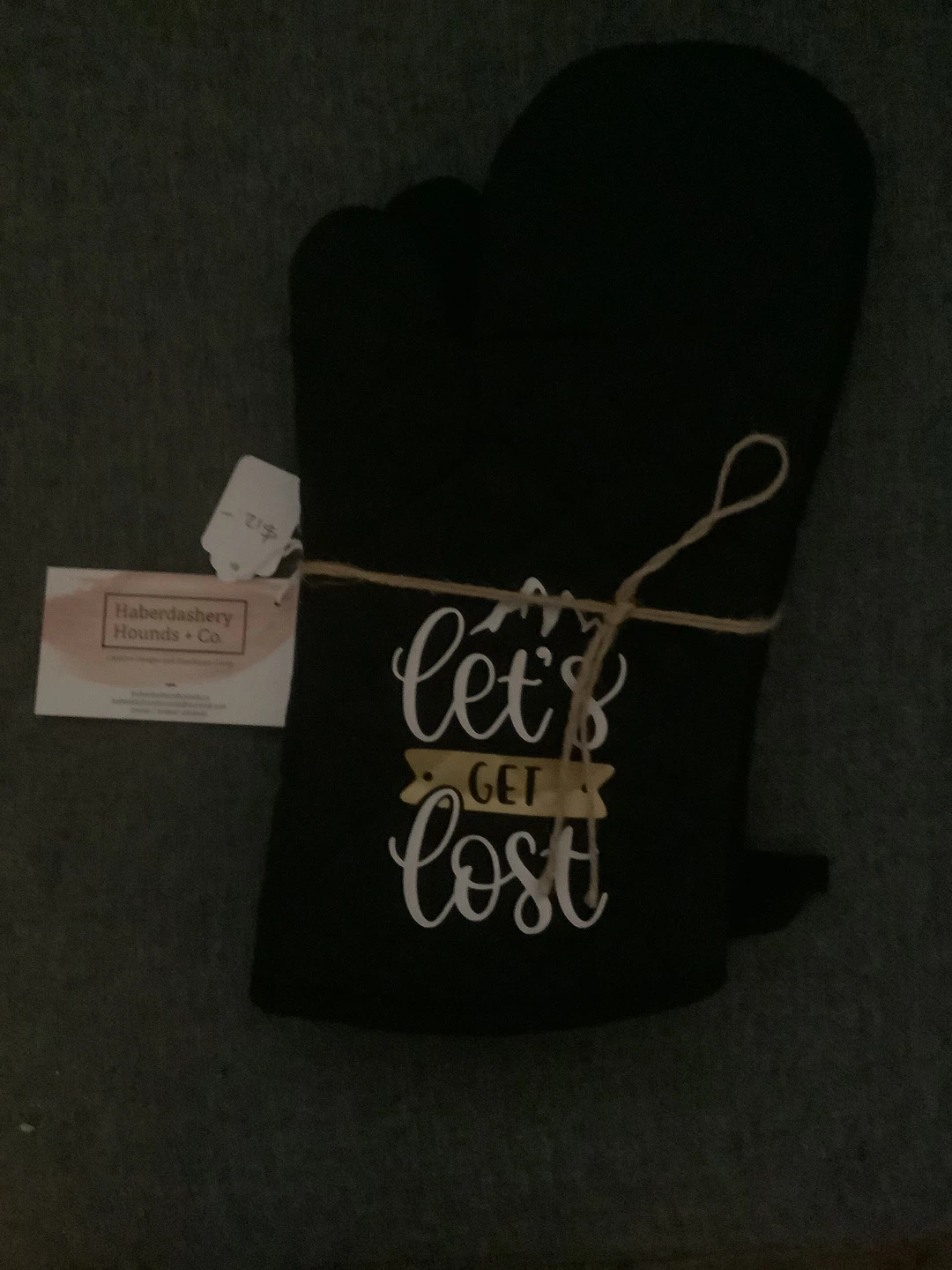 Black Oven Mitt with "Let's Get Lost" graphic