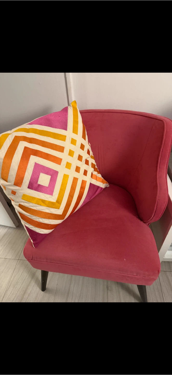 Pink Accent Chair with Geometric Pillow