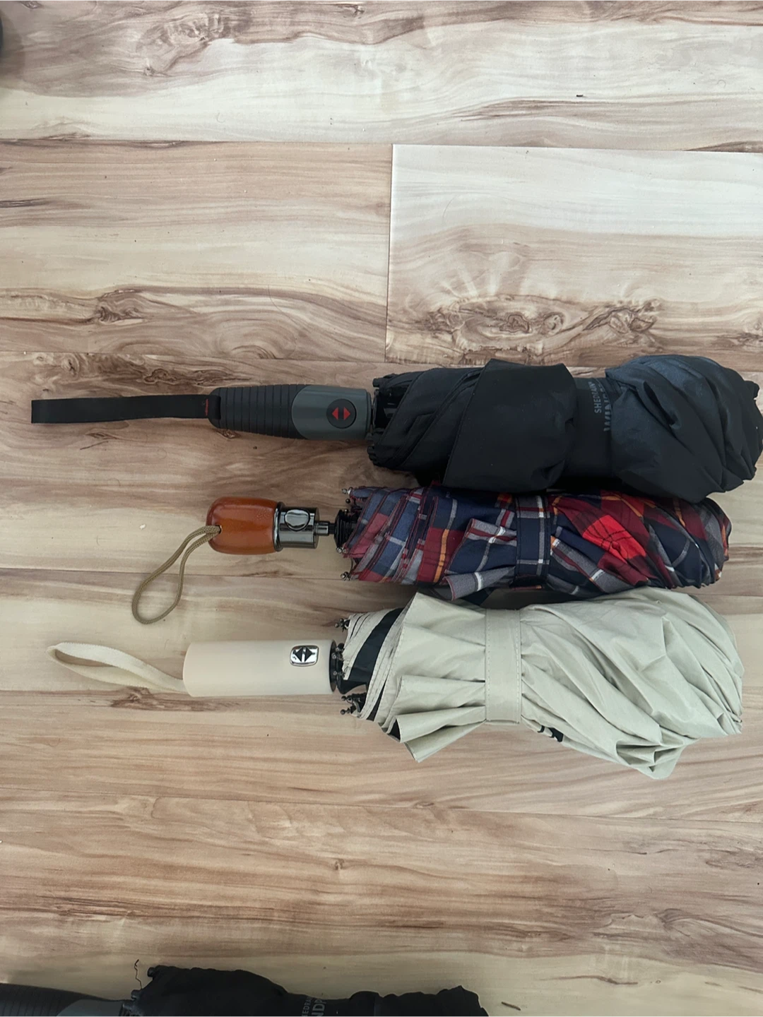 Three Compact Umbrellas