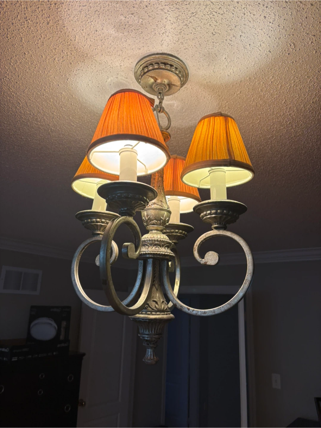 Chandelier with cream pleated shades