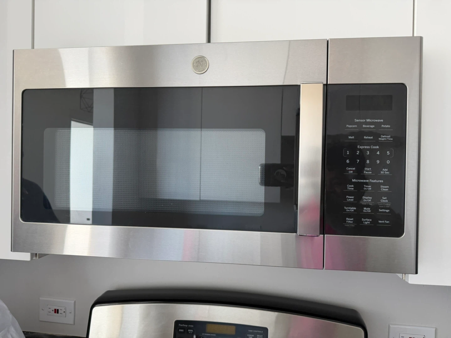 GE Stainless Steel Over-the-Range Microwave - photo 2