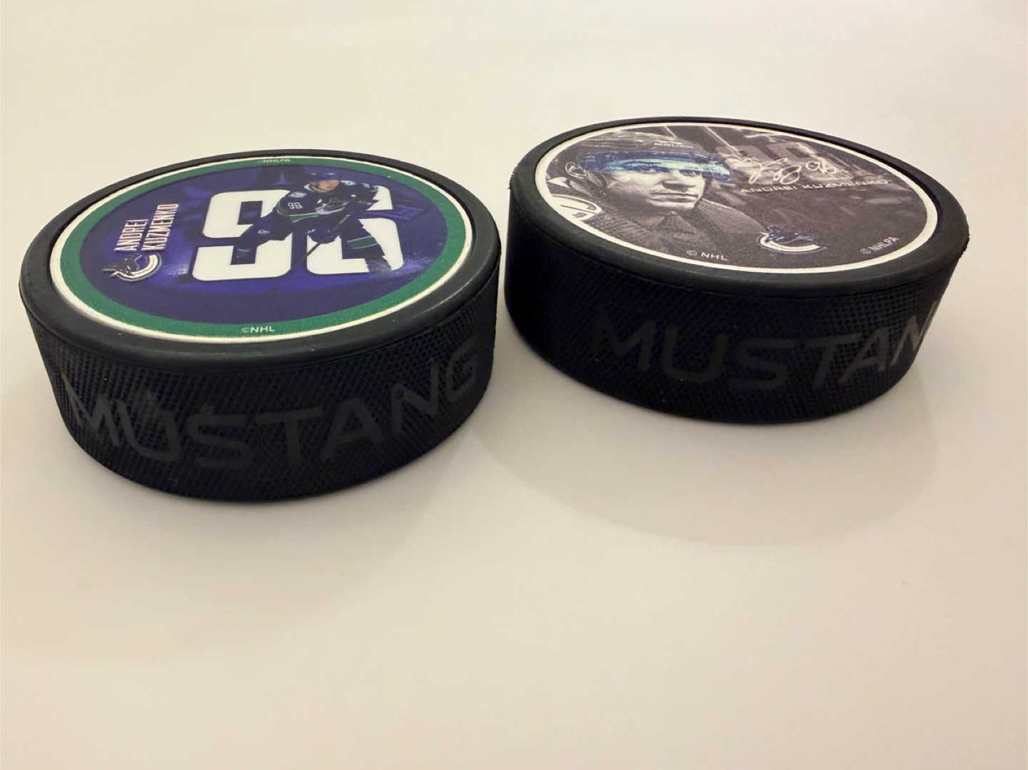 Official Vancouver Canucks Andrei Kuzmenko Player Hockey Pucks - photo 5