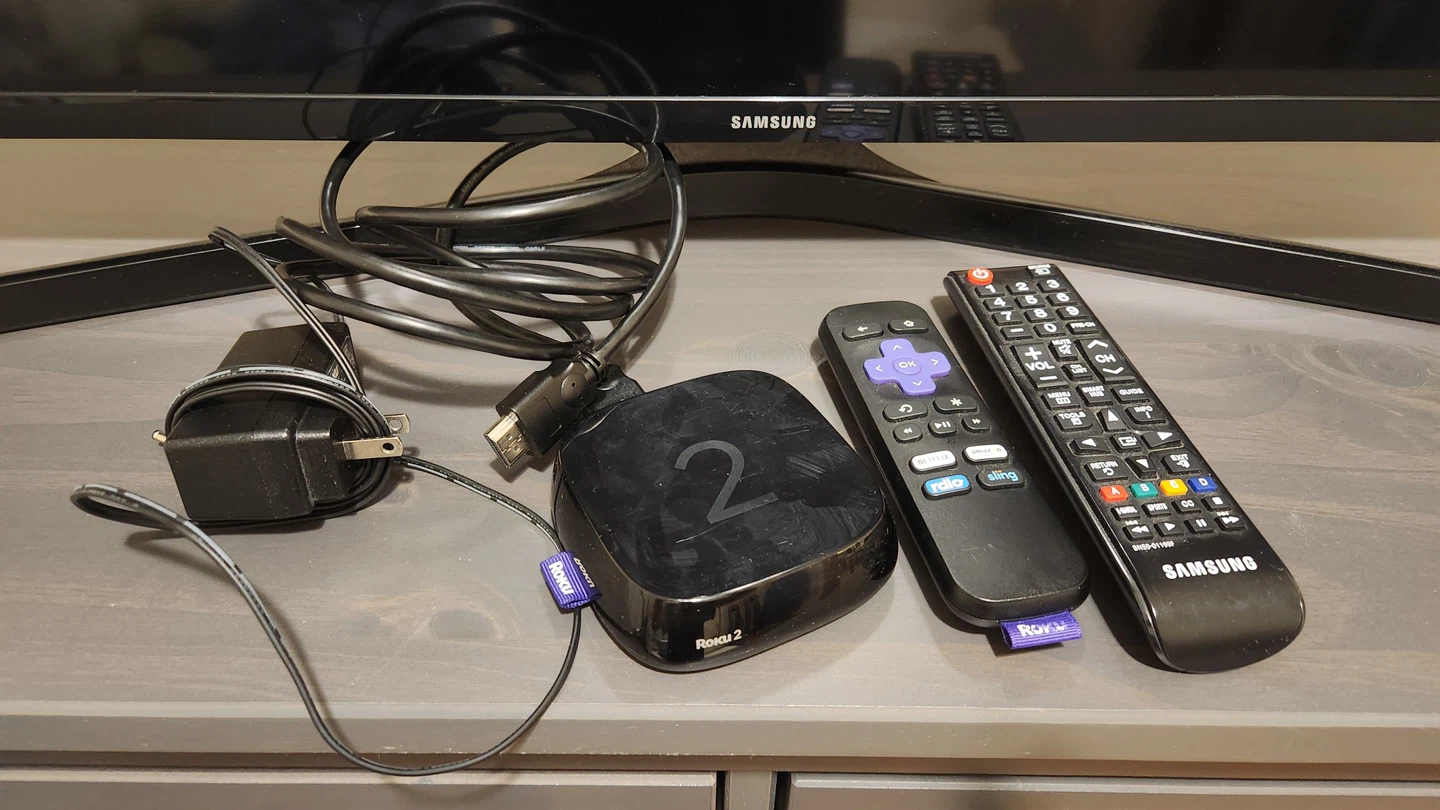 Samsung 40” TV + Roku (Remote Included) - photo 2
