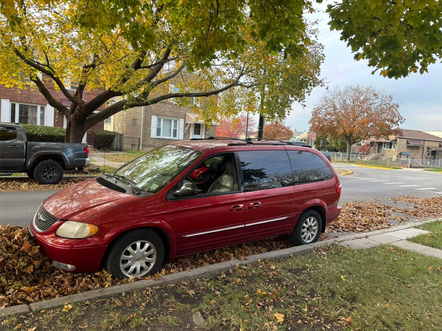 Red Chrysler Town & Country Minivan
