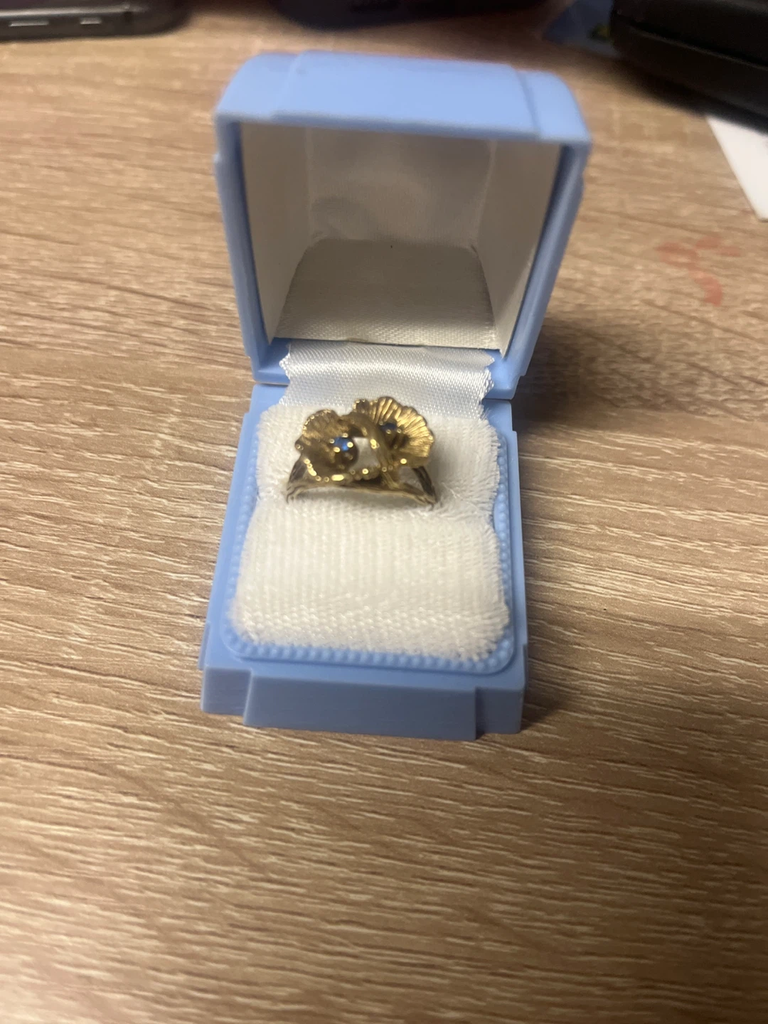 Gold Flower Ring with Blue Stone