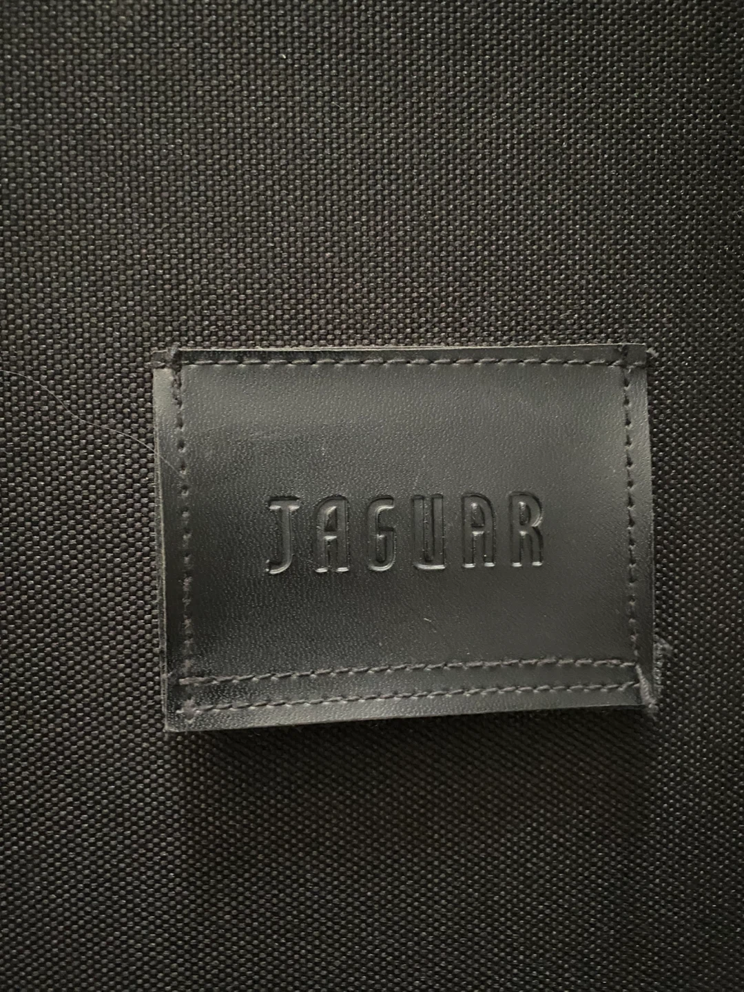 Jaguar Black Rolling Suitcase