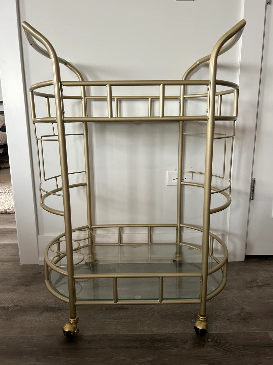 Two tier gold metal and glass bar cart