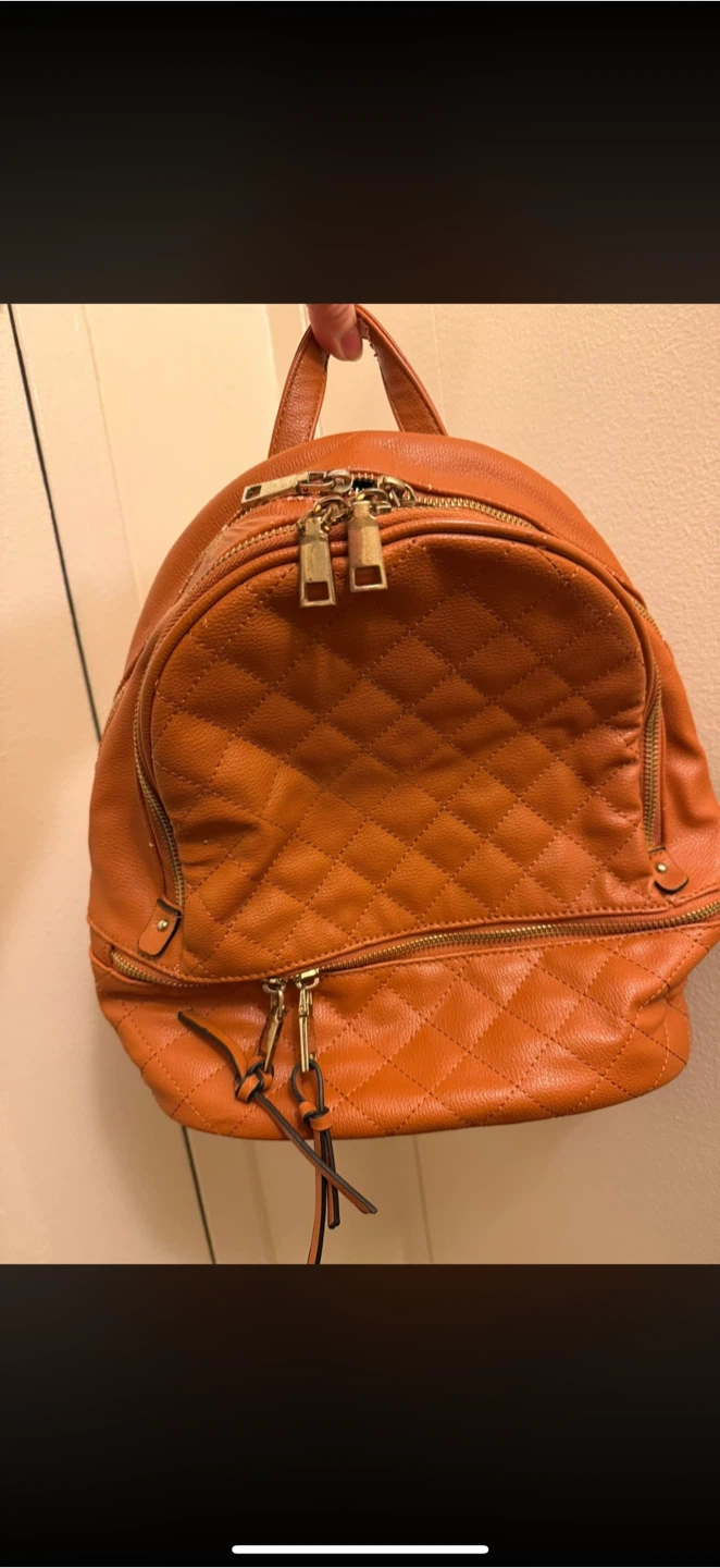 Quilted Orange Backpack with Multi Zippers for sale!