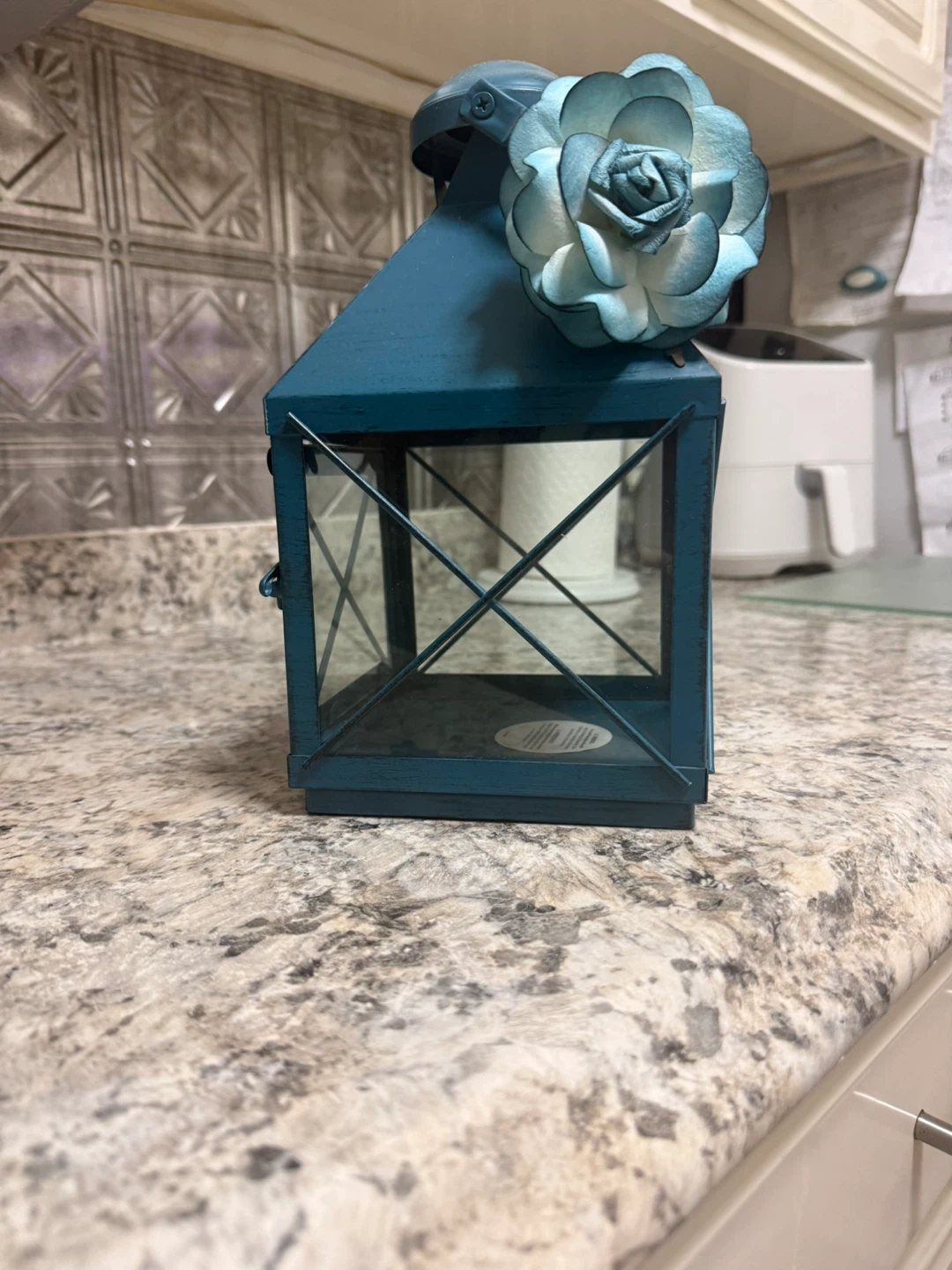 Teal Decorative Lantern with Flower Accent