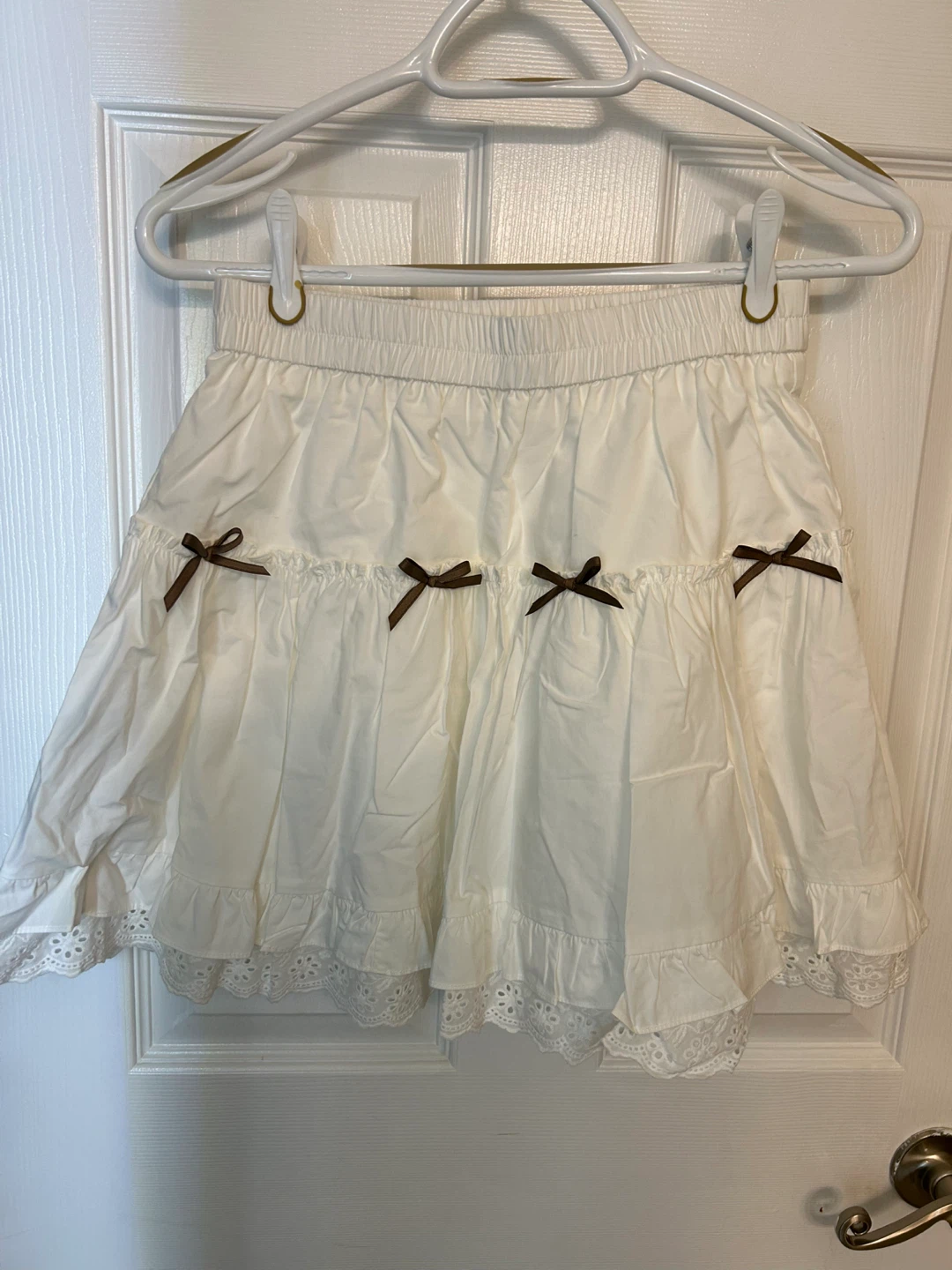 Two mini White Ruffle Skirt with Bows and Lace Trim