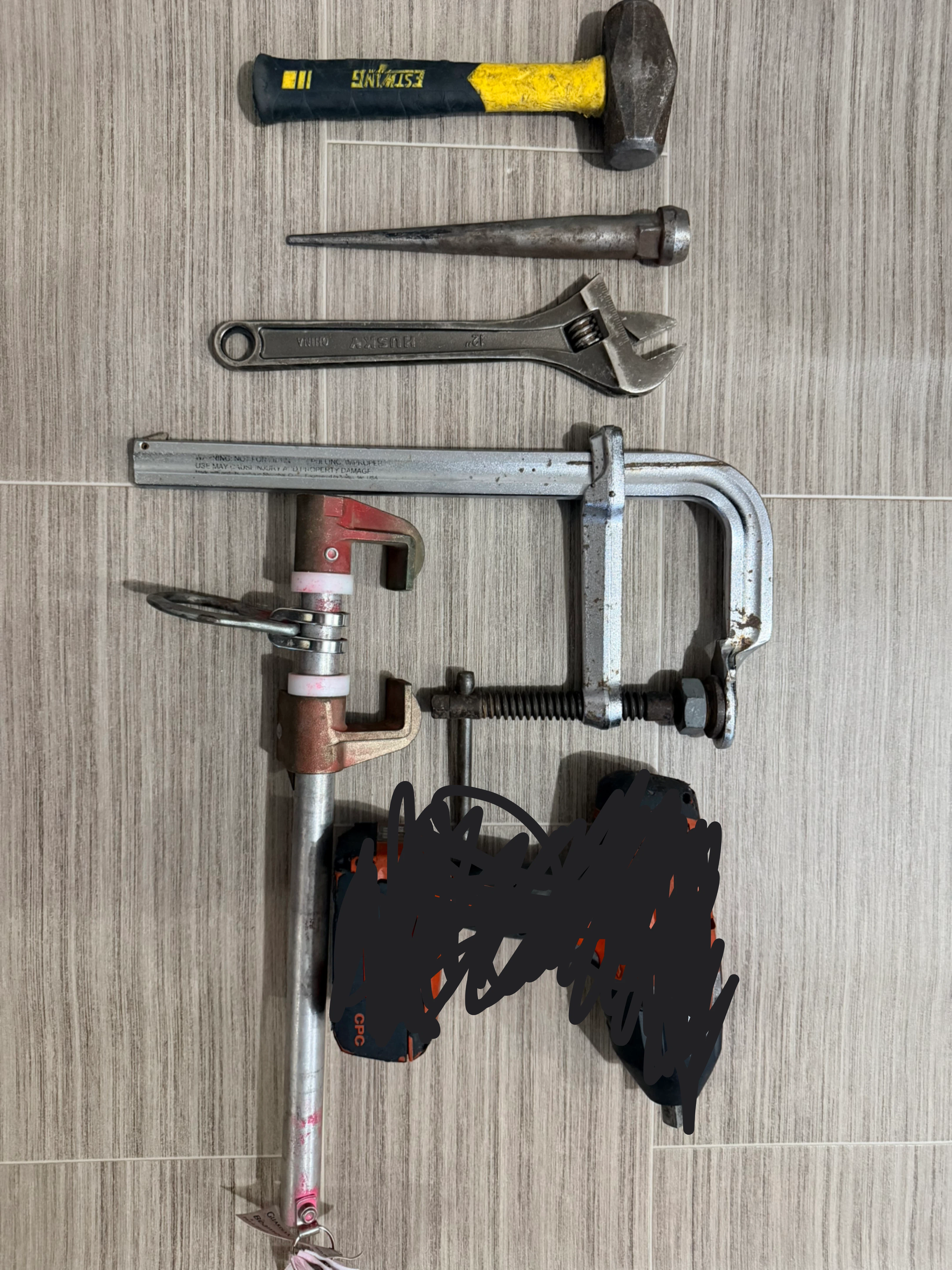 Assorted Hand Tools: Hammer, Wrench, Clamp, and Punch