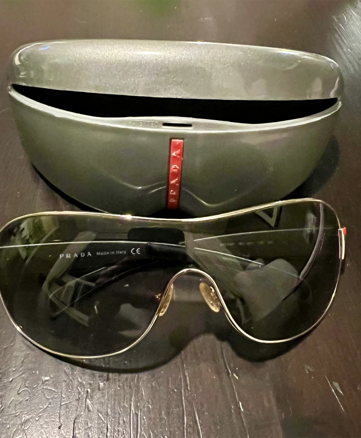 Authentic Prada sunglasses with original Prada case.