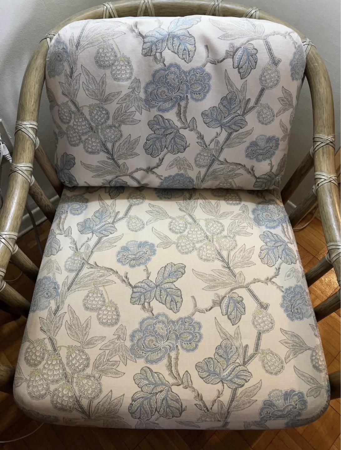 Rattan Armchair with Floral Cushions
