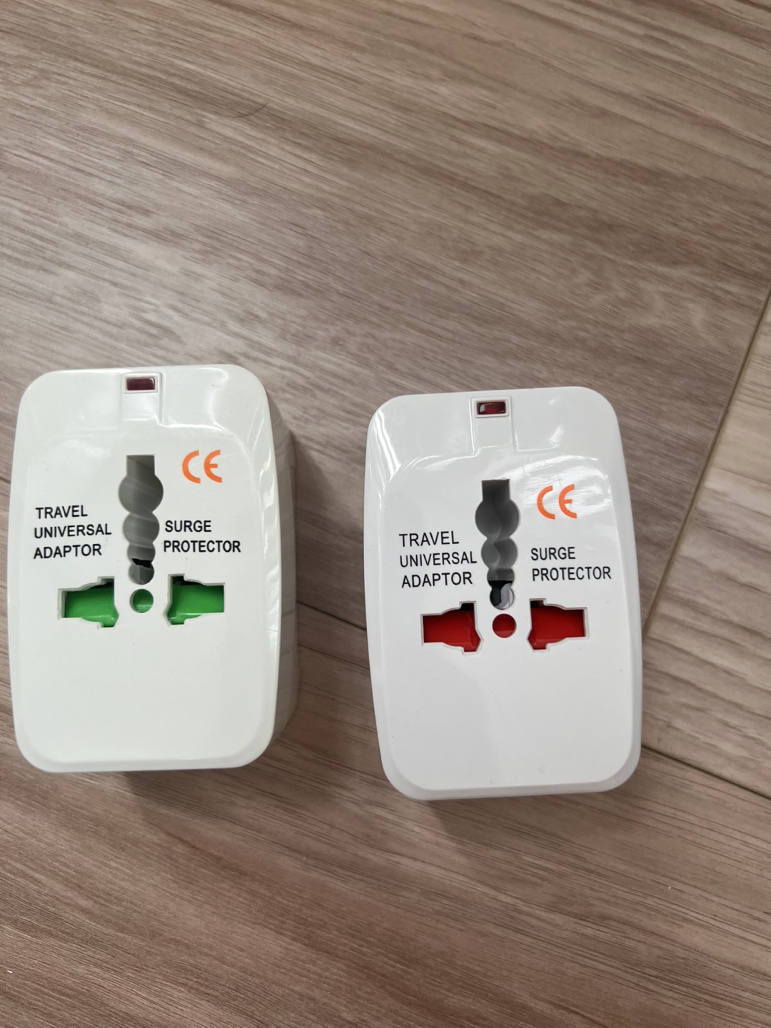 Universal Travel Adaptors with Surge Protector for last one 🧡