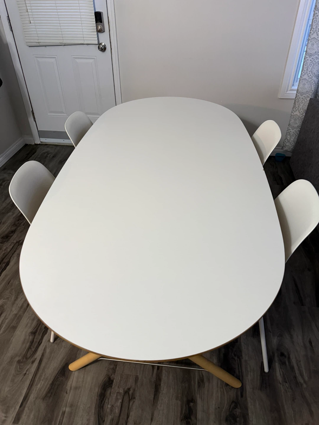 White Oval Dining Table with 4 Chairs