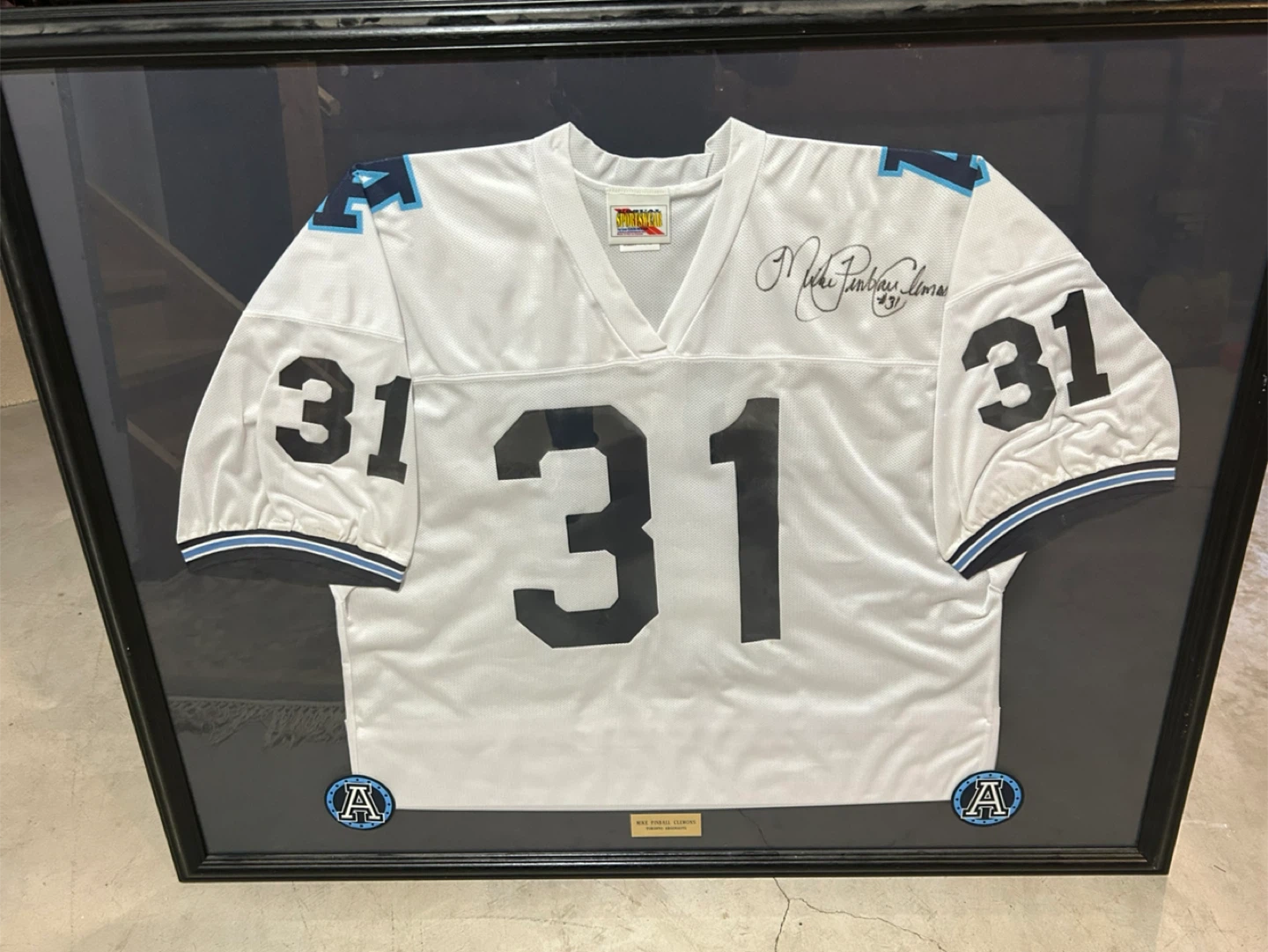Pinball Clemons framed/signed jersey
