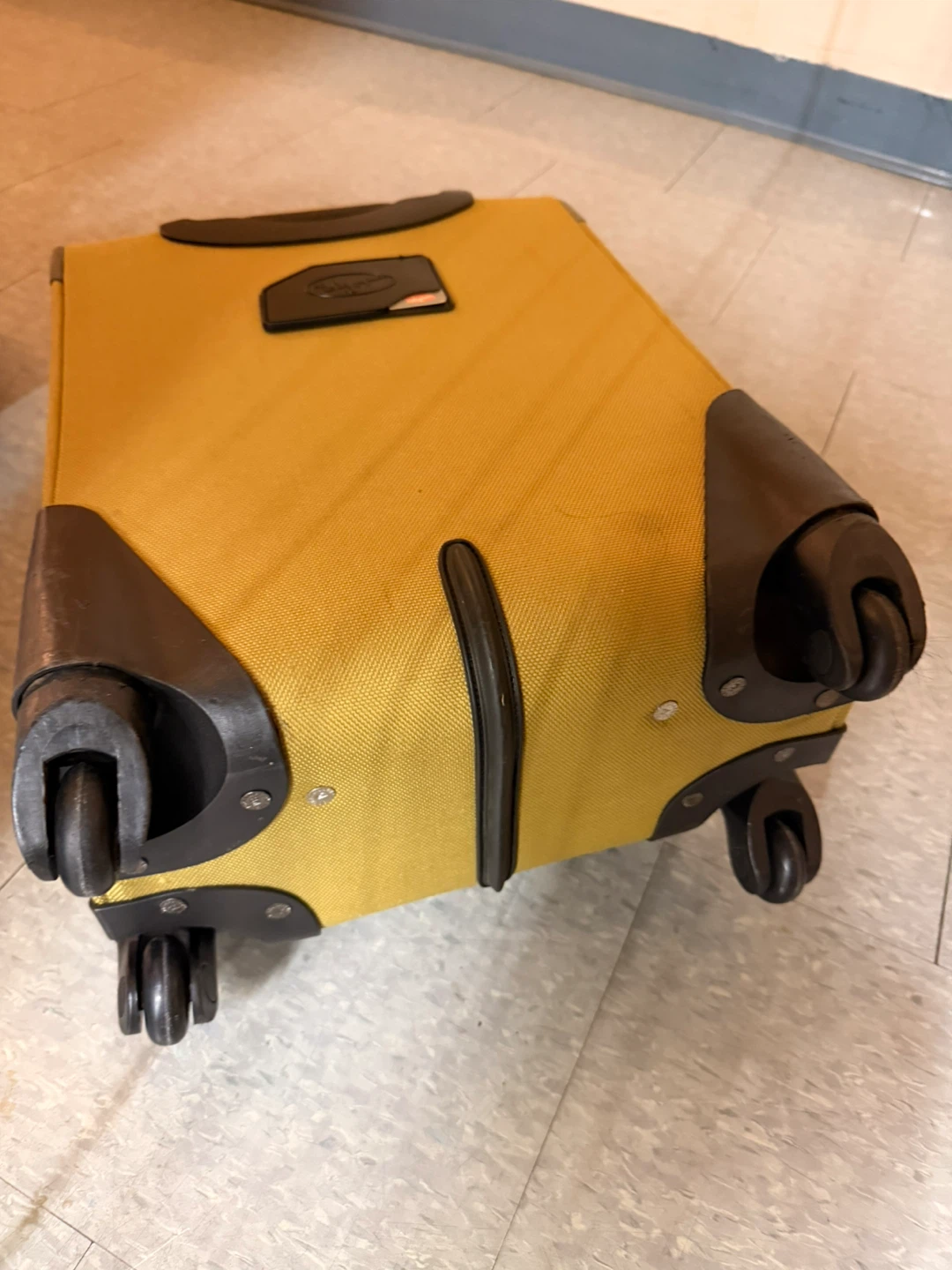 Olympia Yellow Rolling Carry-On Suitcase - photo 3