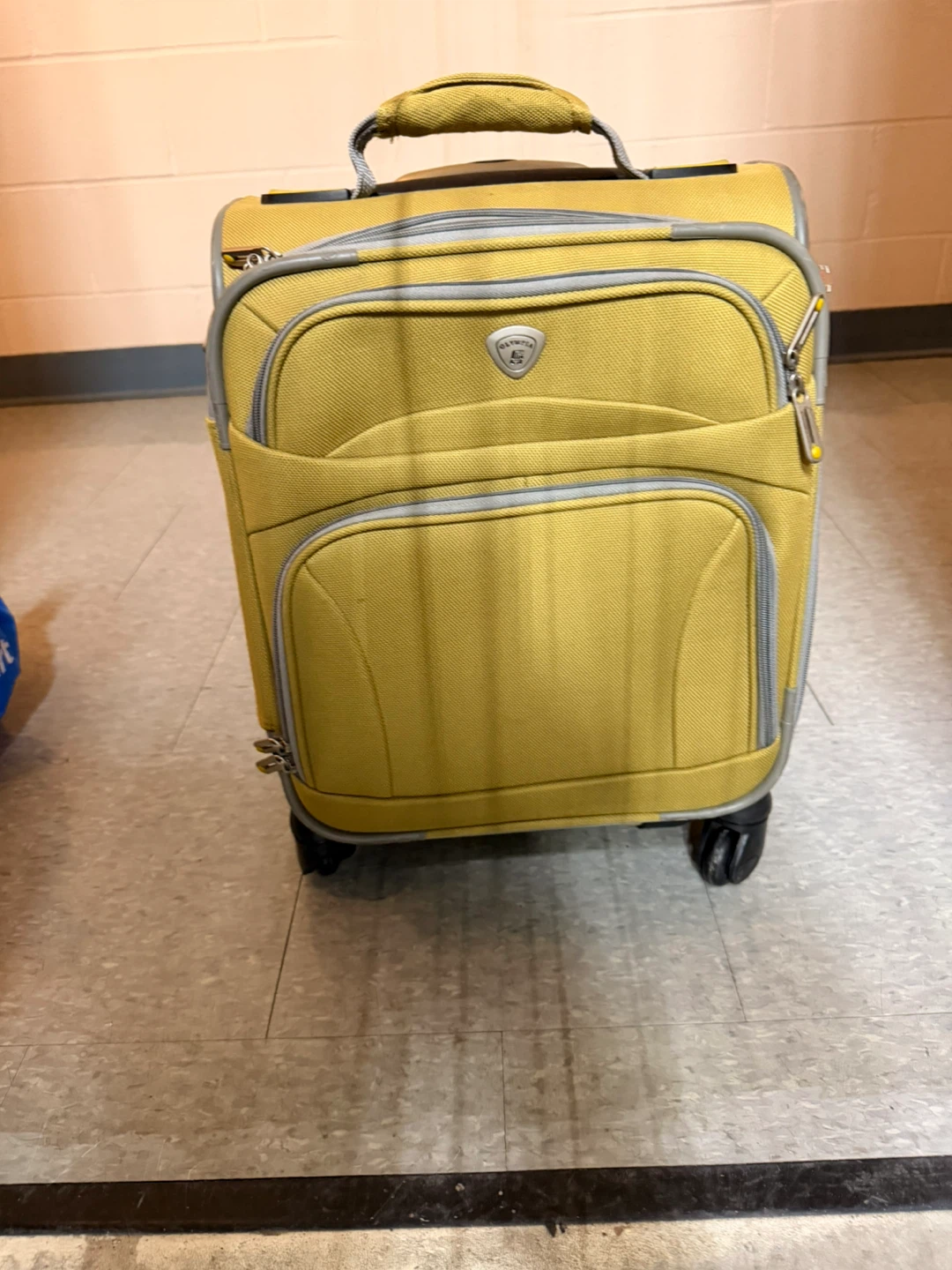Olympia Yellow Rolling Carry-On Suitcase