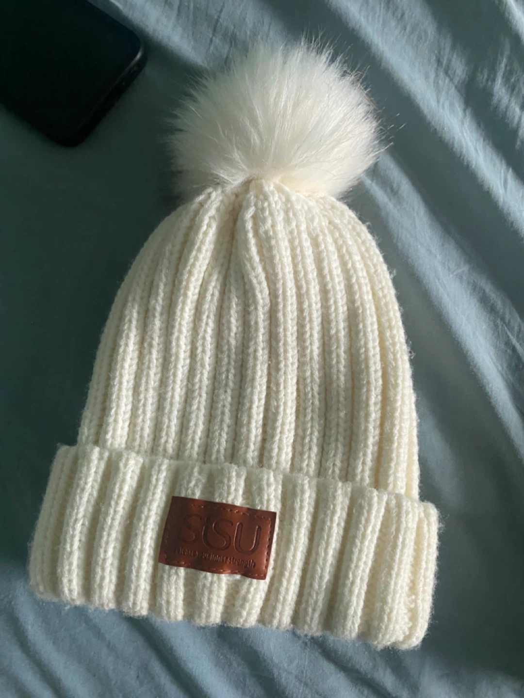 White Sisu Pom Pom Beanie