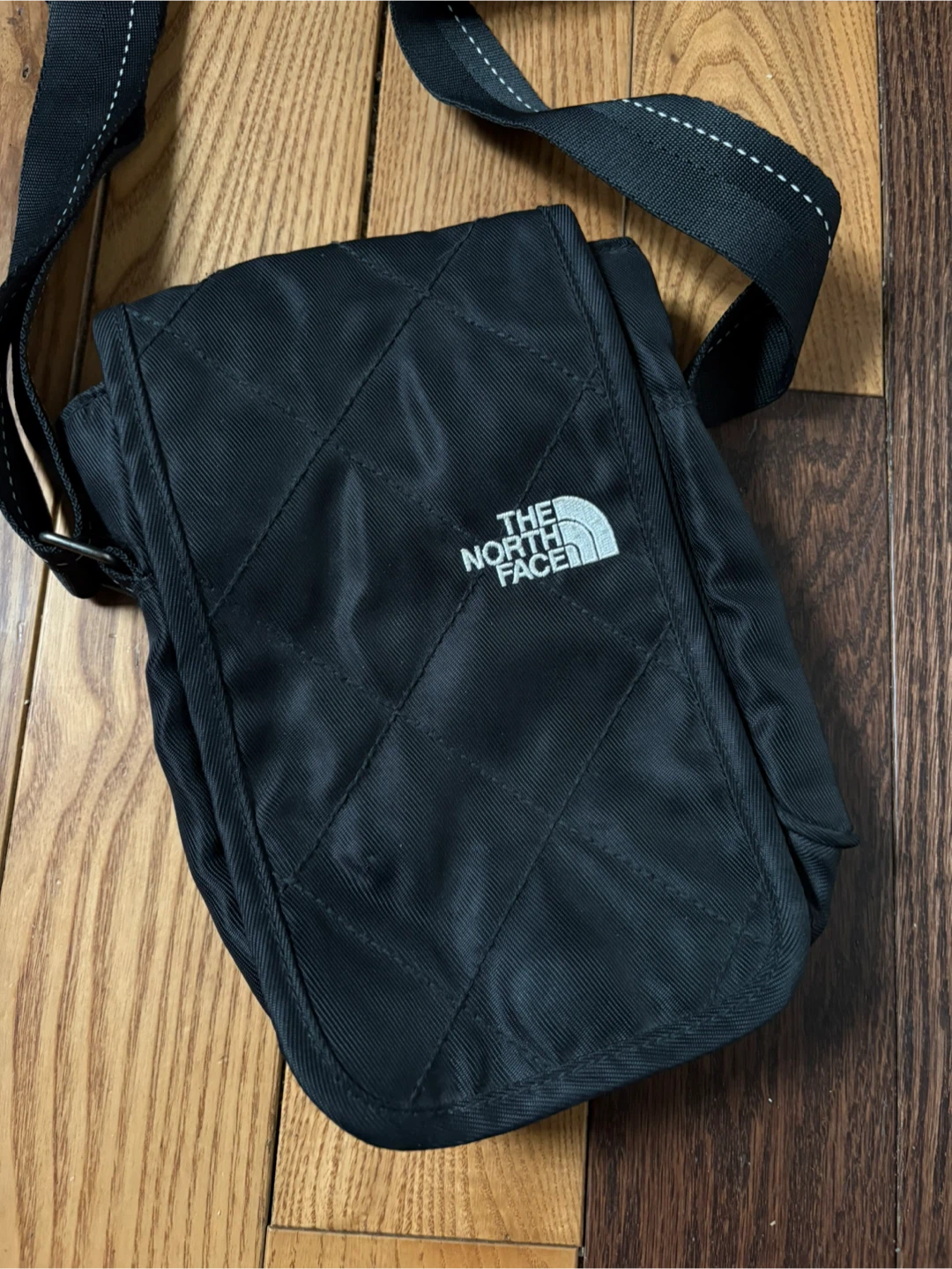 The North Face TNF Black Quilted Crossbody Bag mec acg