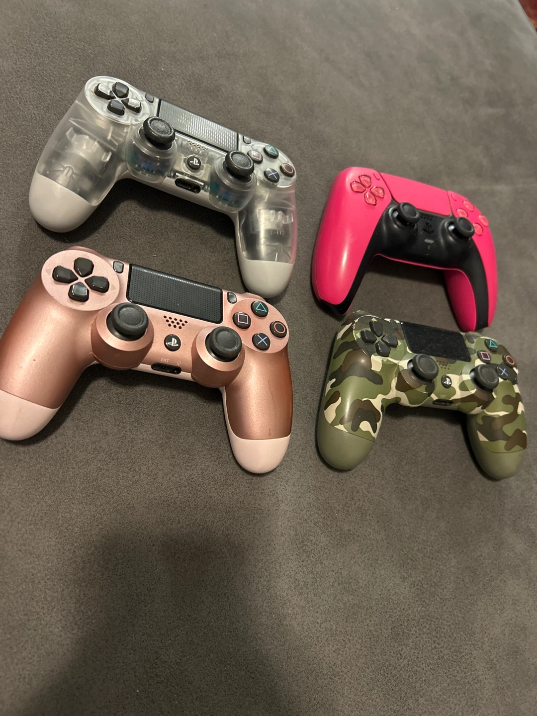 Lot of 4 Video Game Controllers (Pink, Camo, Rose Gold, Clear)