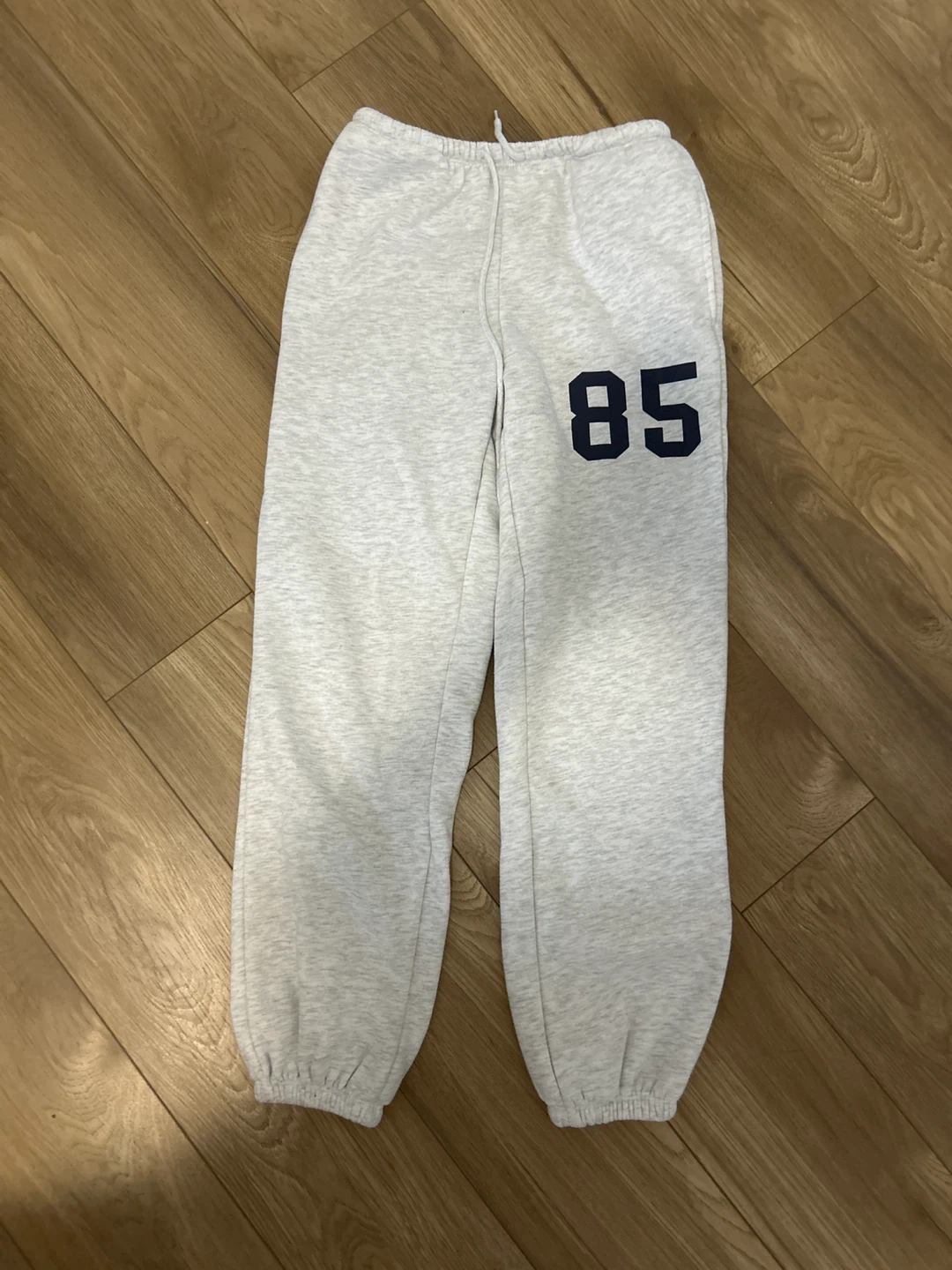 Grey Sweatpants with '85' Graphic